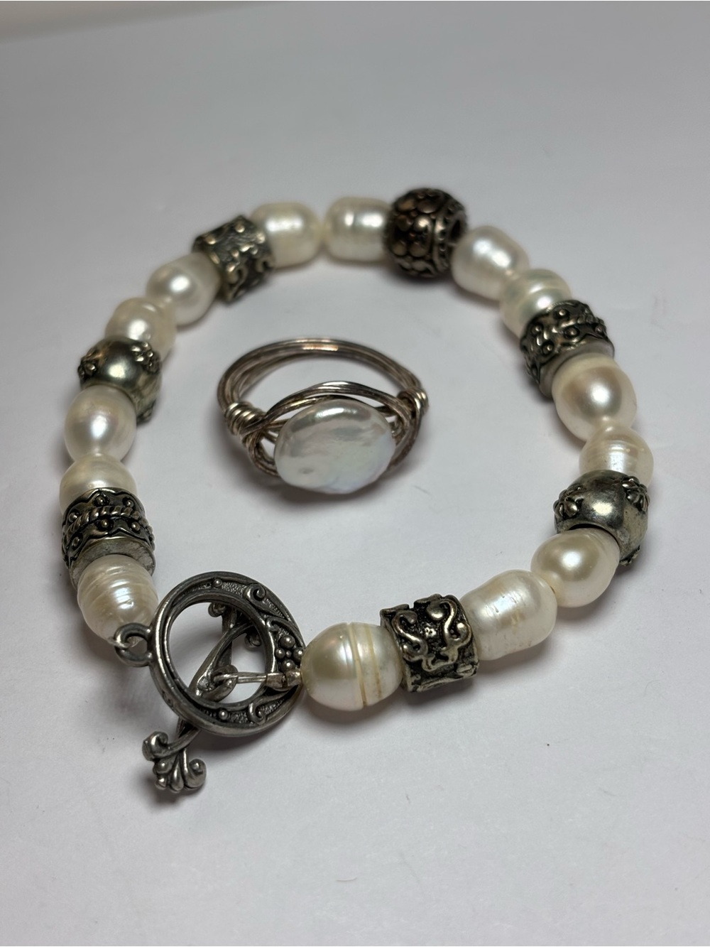 Pearl Ring (925 wrapped) and sterling silver and freshwater pearl bracelet.